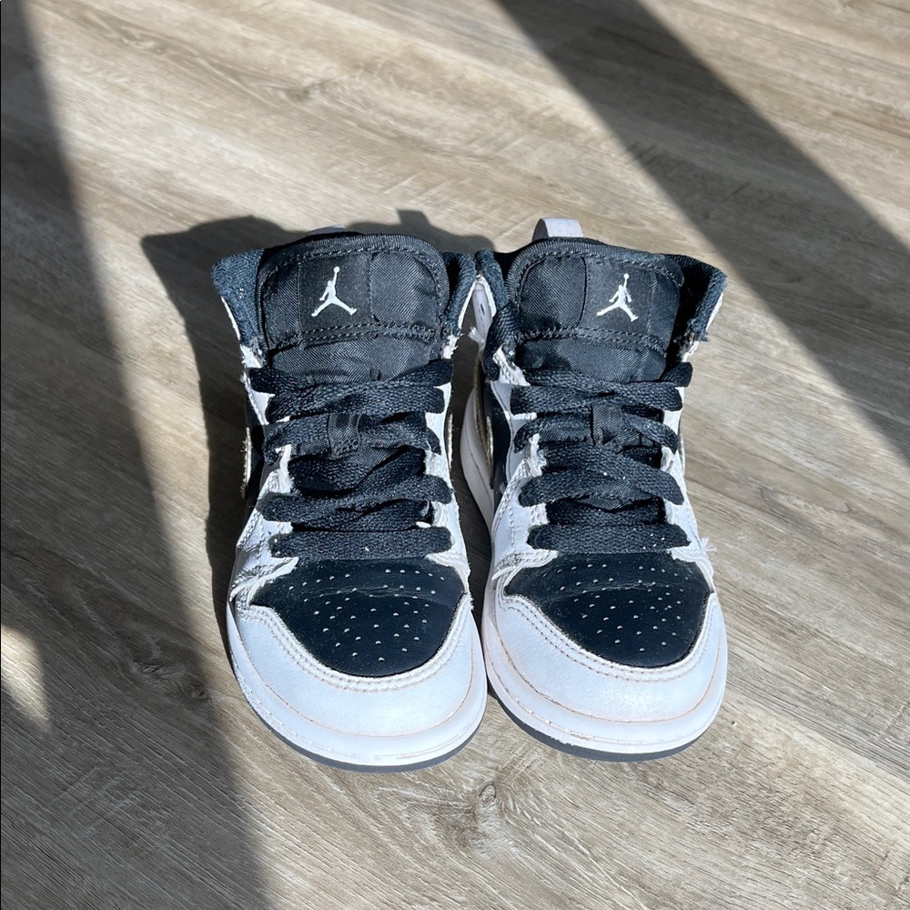Jordan 1 Mid Kids Black, Gold, and White Sneakers